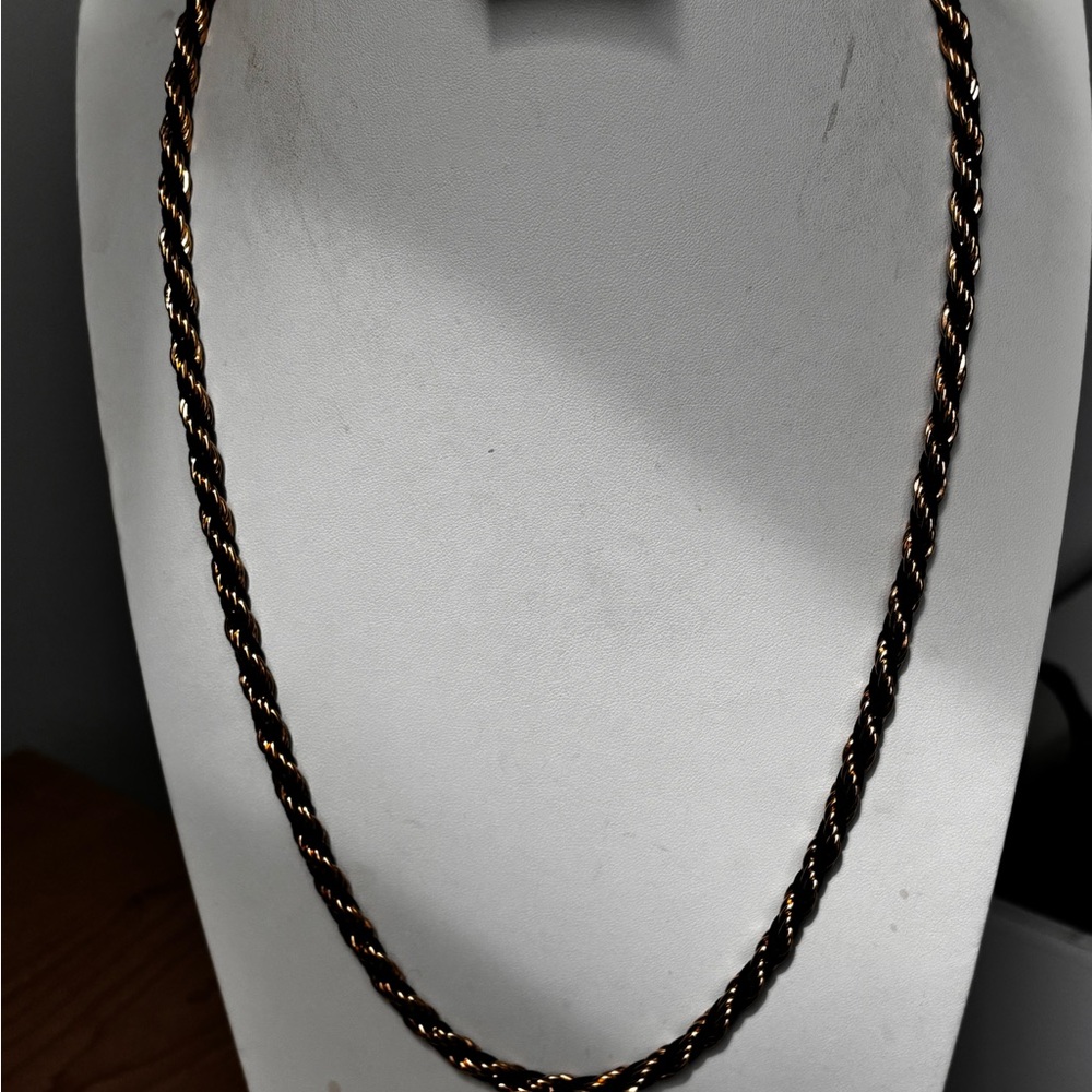 Vintage Trifari necklace/gold tone and black twisted rope chain / measures 24 in